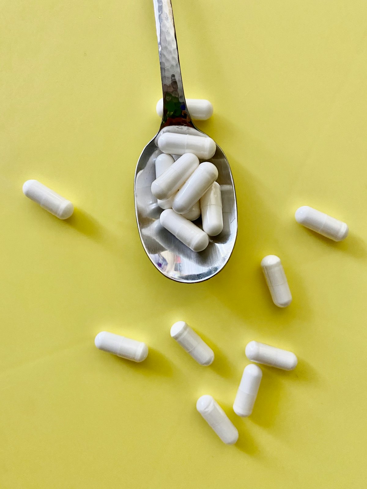 Capsules on a spoon